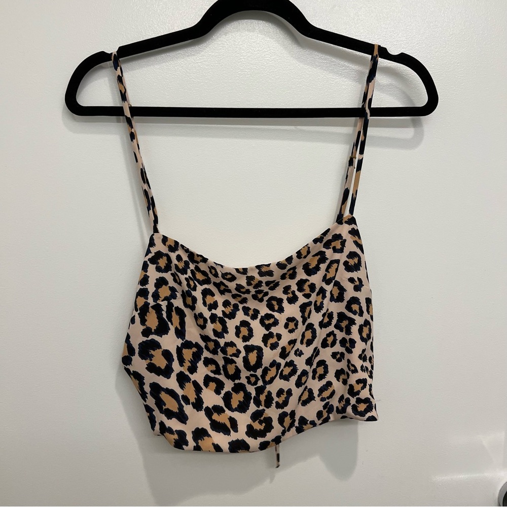 Open Back Crop top, with two ties in the back. Reversible Size Large